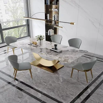 Italyan minimalist ithal kaya plaka paslanmaz çelik şekilli yemek masası ve yemek sandalyesi kombinasyonu basit modern dikdörtgen